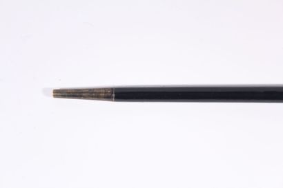 null Fine cane in black wood, long black and gold knob with inlaid metal decoration...