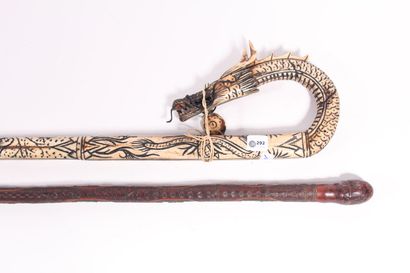 null Bone cane carved in the shape of a dragon with six sections, 10th century. Length...