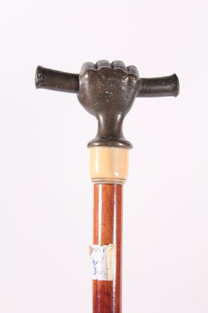 null Cane puzzle, the shaft in rush of Malacca, ring way ivory, pommel in bronze...
