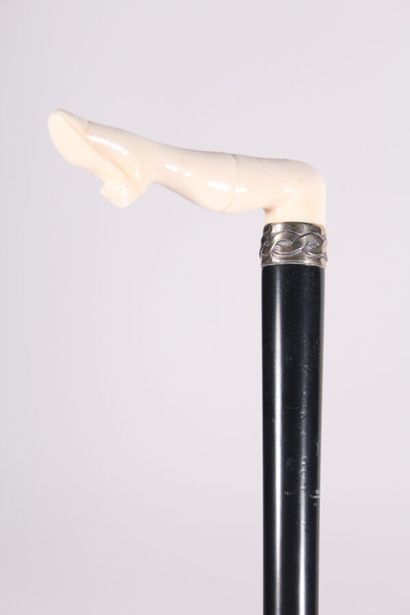 null Cane known as "Vieux beau", the handle square in ivory in the shape of a woman's...