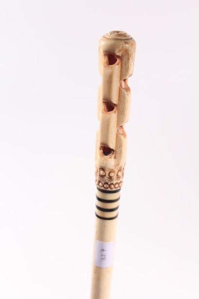 null Cane, the bone shaft decorated with four ebony fillets at the top, the bone...