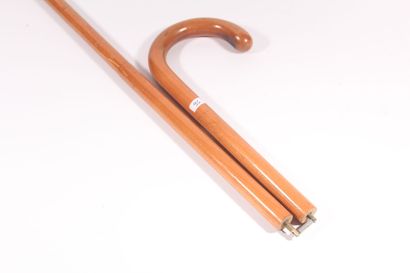 null Blond wood cane, foldable, pommel stock. Length 90 cm.