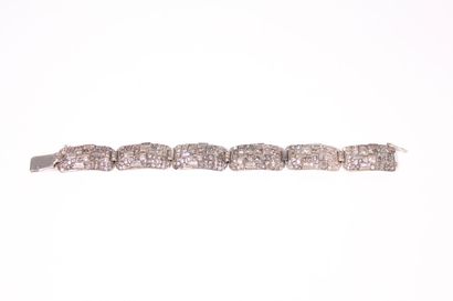 null Art deco silver and white imitation stones bracelet, made of six curved rectangular...