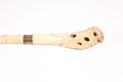 null Beautiful asian cane in carved bone like bamboo, the pommel with openwork water...