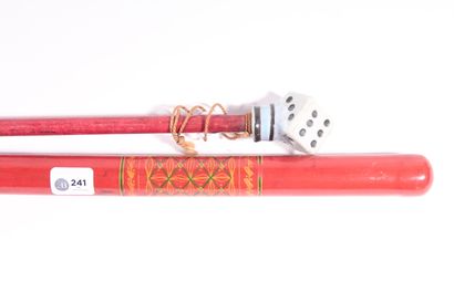 null Fine cane in red wood, the pommel in porcelain in the shape of dice, length...