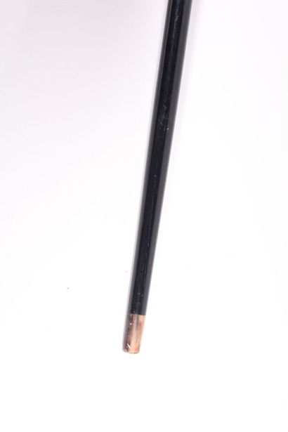 null Cane with system, the shaft out of black wooden, the flattened knob out of brass,...