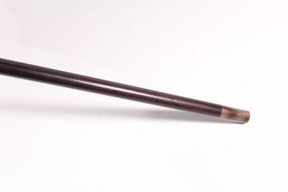 null Cane, the shaft in rosewood, the silver pommel in the shape of a flowered basket,...