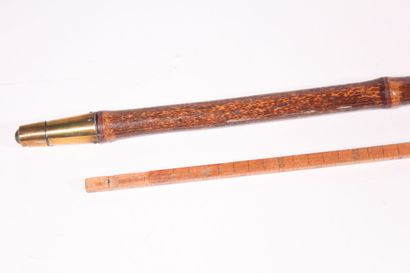 null Cane with "toise" system in bamboo, ferule and brass ring, length 92 cm.