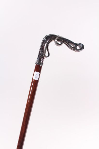 Cane, the shaft in mahogany, the knob square...