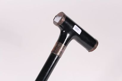 null Cane with black wood system, the square knob housing a telescopic sight protected...