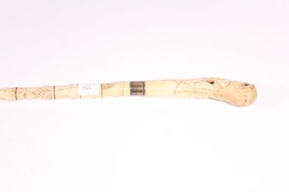 null Beautiful asian cane in carved bone like bamboo, the pommel with openwork water...