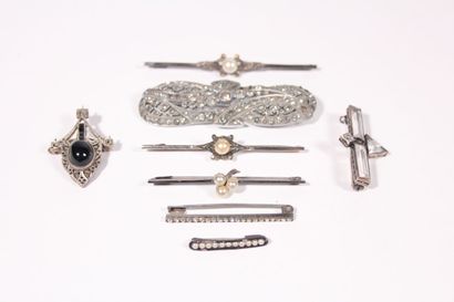 Seven Art Deco silver brooches set with imitation...