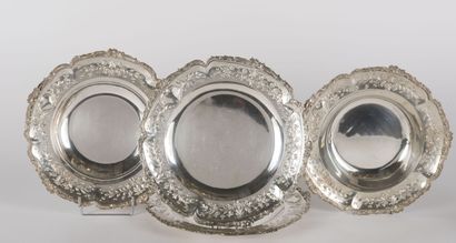 A pair of foreign silver dinner plates and...