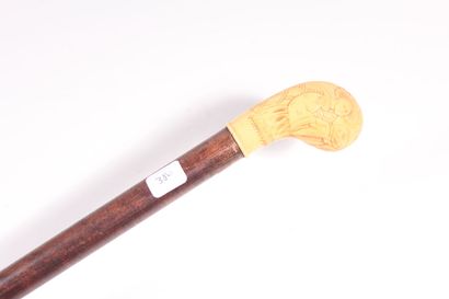 null Folding cane, wooden shaft, ovoid handle slightly curved in ivory composition,...