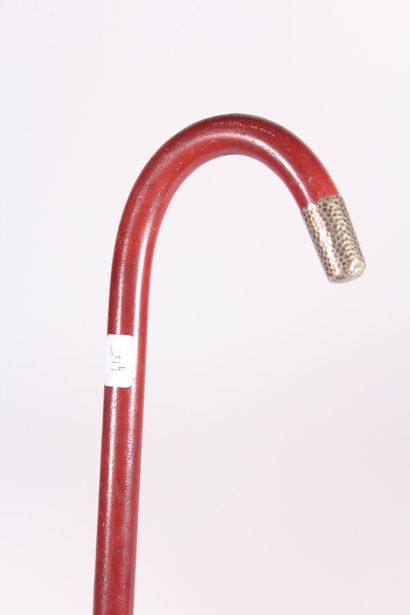 Cane stick in metal painted in red, the end...