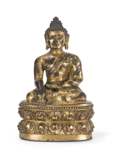 Statuette de bouddha en bronze doré 
Chine,...