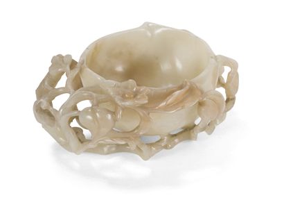 null Jade brushes
China, 19th century
In the shape of a peach, the edge carved and...