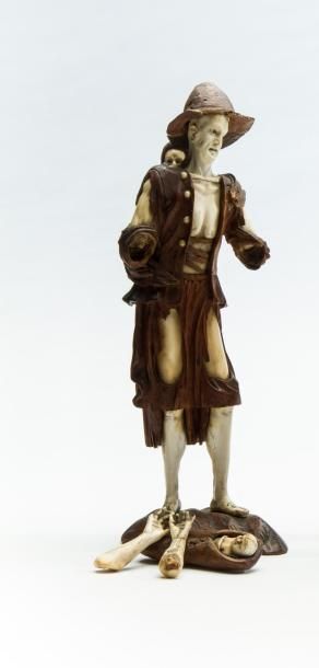 null UN GUEUX ET SES ENFANTS

Statuette en bois et ivoire représentant un homme portant...