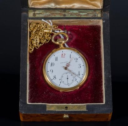 null Une montre de poche chronomètre en or jaune 750/1000ème, cadran émaillé blanc...
