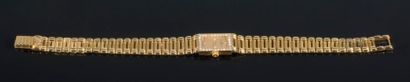 null Baume et Mercier, montre bracelet de dame en or jaune 750/1000ème, boîtier rectangulaire,...
