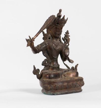 null Statuette de Manjusri en bronze

Tibet

Assis en padmasana sur une base lotiforme,...