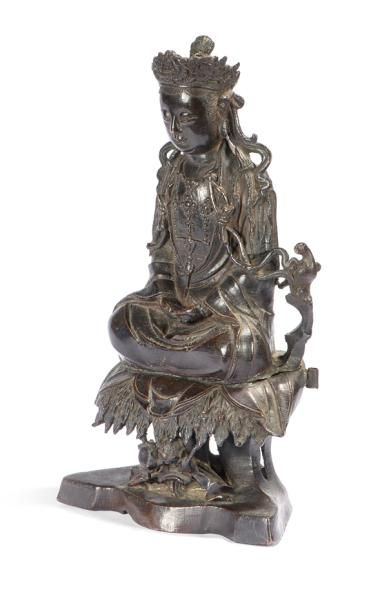 null Statuette de Bodhisattva en bronze

Chine, XVIIème / XVIIIème siècle

Assis...