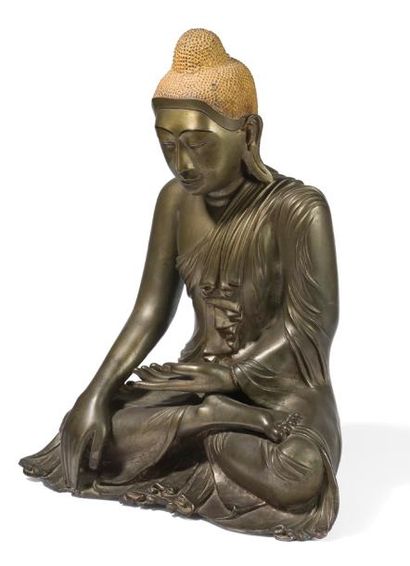 null Bouddha en bronze 

Birmanie, Mandalay, XIXème siècle

Assis en padmasana, les...
