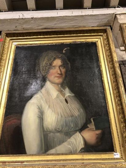 null ECOLE DU XIXème SIECLE, "Portrait de femme au livre", huile sur toile (accidents...