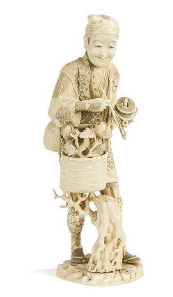 null Groupe en ivoire sculpté
Japon, vers 1910
Représentant un vendeur de fleurs...