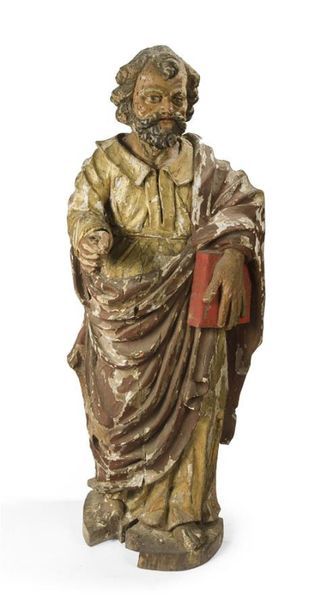 null Deux figures en noyer peint et doré, l'une représentant Saint Pierre tenant...