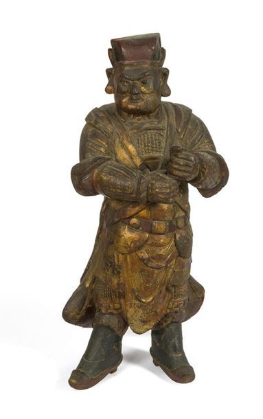 null Gardien en bois laqué rouge et orchine. Fin de la Dynastie MING, XVIIE siècle....