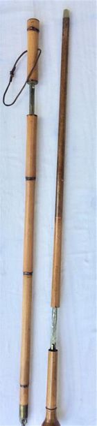 null Deux cannes épée en bois : une en bambou et une dont la lame est gravée Toledo...
