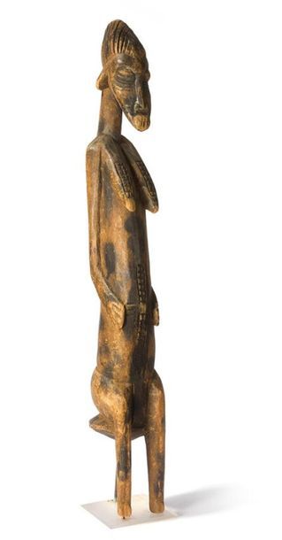 null STATUE FéMININE 
Bois sculpté.
Haute Côte d'Ivoire, Senoufo
Haut.: 65 cm