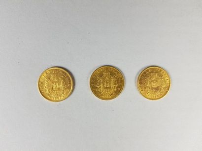 null Lot de trois pièces de vingt francs or Napoléon III lauré, 1861, 1863, 1865...