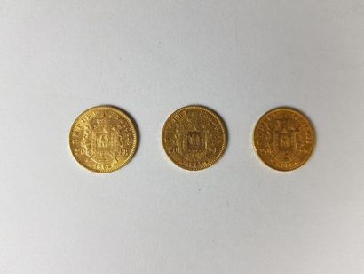 null Lot de trois pièces de vingt francs or Napoléon III lauré, 1862, 1863, 1867...