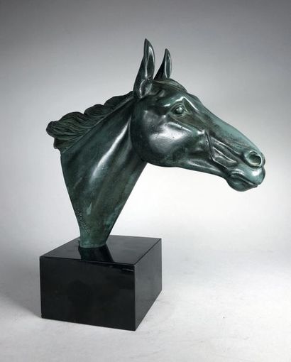 null Irénée ROCHARD (1906-1984)
Tête de cheval de course.
Sculpture en métal patiné...