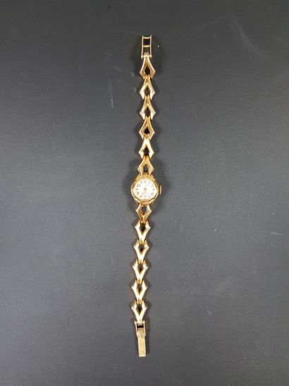 null Montre bracelet de dame en or jaune 18K (750°/°°), le cadran circulaire à chiffres...