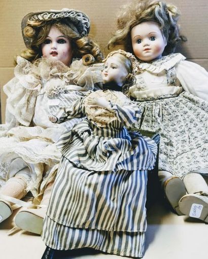 Deux poupées modernes avec tête en biscuit...