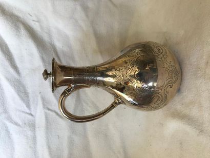 null Silver jug carved with military trophies, ivory insulation. England, Sheffield,...