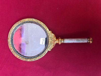 null Hand mirror in chased brass, carved wood and onyx handle. L : 29 cm