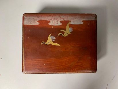 null Lacquered box containing ten trinkets including belt buckles and thread cou...