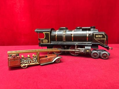 null JEP. North locomotive made of painted sheet metal. A small (broken) wooden fire...
