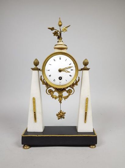 null Portico clock, the dial supported by two marble obelisks and topped by a gilded...