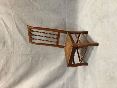 null Nurse's chair made of straw cherry wood.