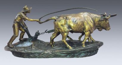 null Edouard DROUOT (1859-1945) Ox
cart. 
Sculpture in patinated bronze. Signed antique...