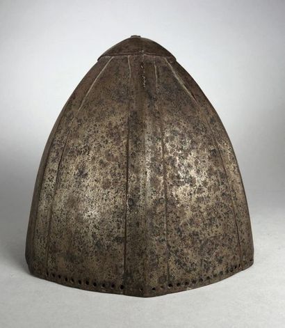 null Wrought iron conical helmet. Stamp reinforced with seven longitudinal ribs....