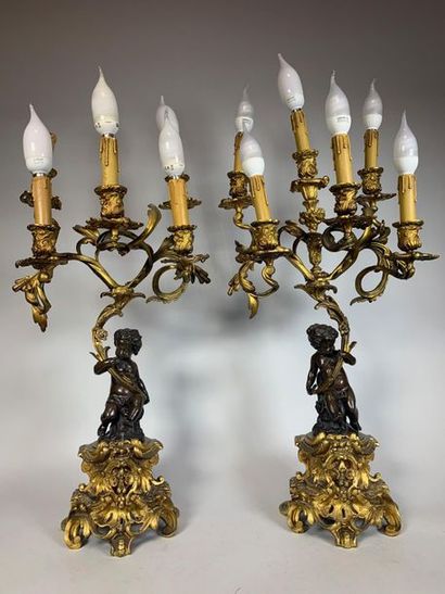 Pair of six-armed candelabra (one arm missing)...