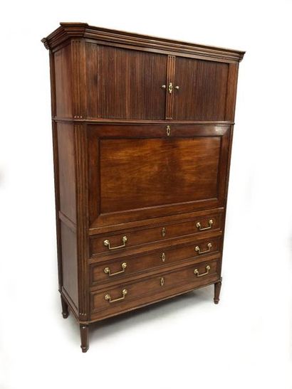 null Mahogany and mahogany veneer secretary opening to a curtain, a flap and three...