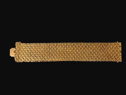 Bracelet manchette en or jaune 18K (750°/°°)...