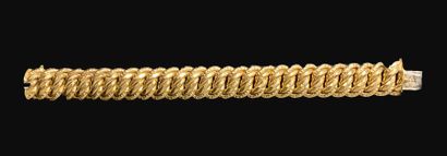 null Bracelet à maille américaine en or jaune 18K (750°/°°).
Long. : 20 cm - Poids...